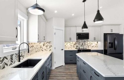 3442 Victory Way, Olds, AB - Indoor Photo Showing Kitchen With Double Sink With Upgraded Kitchen