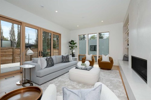 517 28 Avenue Nw, Calgary, AB - Indoor Photo Showing Living Room With Fireplace