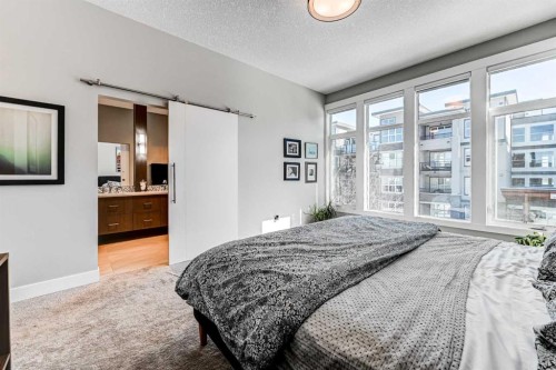 100 Burma Star Road Sw, Calgary, AB - Indoor Photo Showing Bedroom