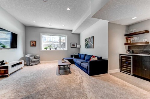 100 Burma Star Road Sw, Calgary, AB - Indoor Photo Showing Living Room