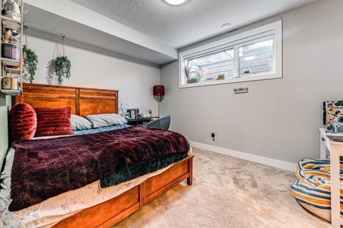 100 Burma Star Road Sw, Calgary, AB - Indoor Photo Showing Bedroom