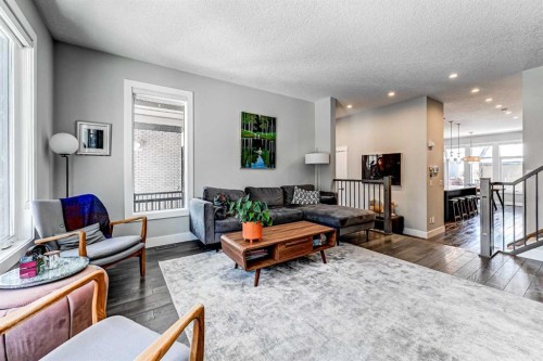 100 Burma Star Road Sw, Calgary, AB - Indoor Photo Showing Living Room