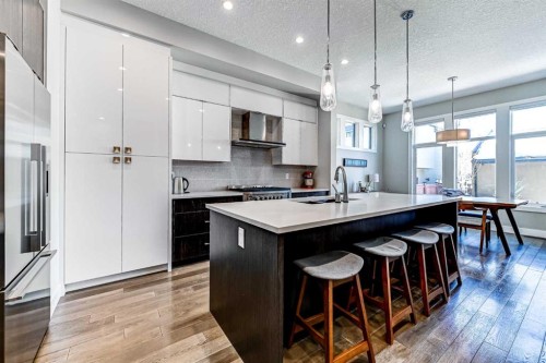 100 Burma Star Road Sw, Calgary, AB - Indoor Photo Showing Kitchen With Upgraded Kitchen