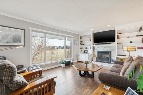 163 Edgebrook Close Nw, Calgary, AB - Indoor Photo Showing Living Room With Fireplace