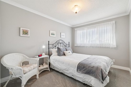 163 Edgebrook Close Nw, Calgary, AB - Indoor Photo Showing Bedroom