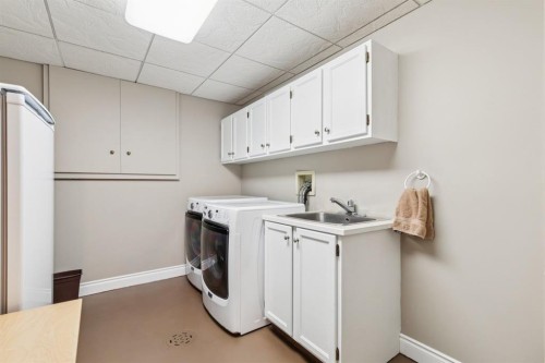 163 Edgebrook Close Nw, Calgary, AB - Indoor Photo Showing Laundry Room
