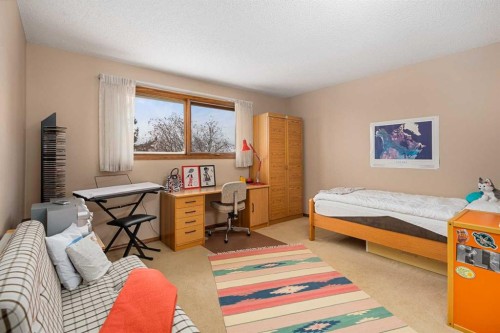 124 Strathbury Circle Sw, Calgary, AB - Indoor Photo Showing Bedroom