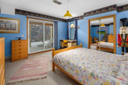 124 Strathbury Circle Sw, Calgary, AB - Indoor Photo Showing Bedroom