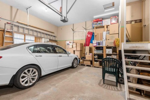 124 Strathbury Circle Sw, Calgary, AB - Indoor Photo Showing Garage