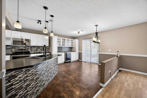 378 Panamount Drive Nw, Calgary, AB - Indoor Photo Showing Kitchen With Upgraded Kitchen