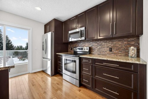 91 Hawkley Valley Road Nw, Calgary, AB - Indoor Photo Showing Kitchen