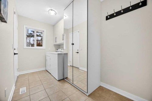 91 Hawkley Valley Road Nw, Calgary, AB - Indoor Photo Showing Laundry Room