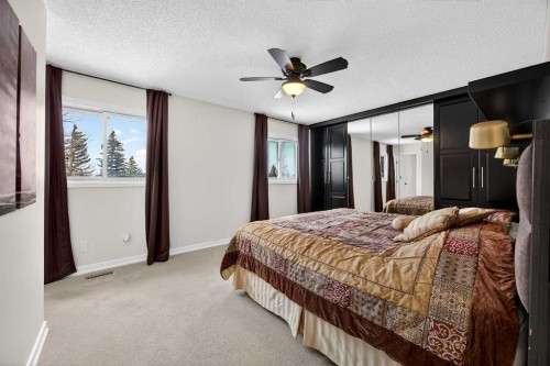 91 Hawkley Valley Road Nw, Calgary, AB - Indoor Photo Showing Bedroom