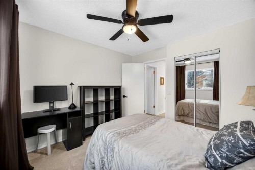 91 Hawkley Valley Road Nw, Calgary, AB - Indoor Photo Showing Bedroom
