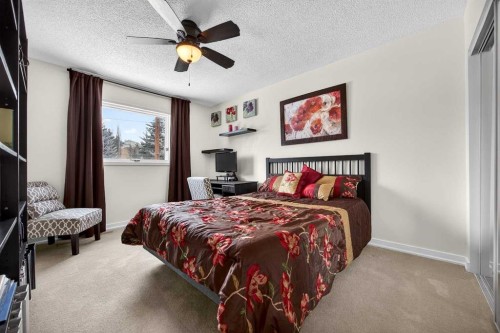 91 Hawkley Valley Road Nw, Calgary, AB - Indoor Photo Showing Bedroom
