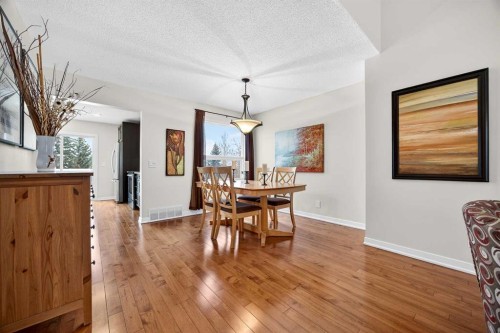 91 Hawkley Valley Road Nw, Calgary, AB - Indoor Photo Showing Dining Room