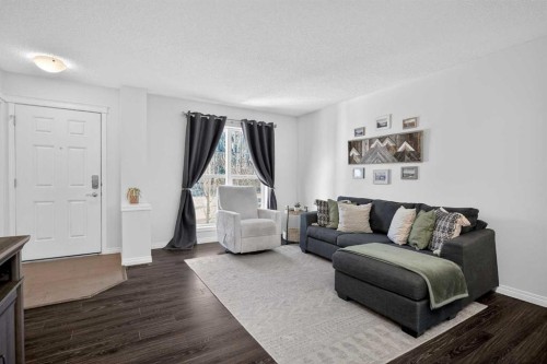 61 Auburn Meadows View Se, Calgary, AB - Indoor Photo Showing Living Room