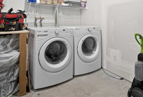 61 Auburn Meadows View Se, Calgary, AB - Indoor Photo Showing Laundry Room