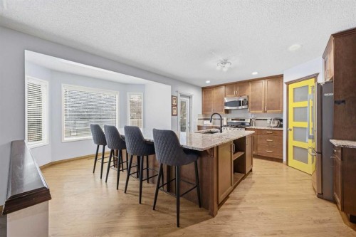 46 Sunset Way Se, Calgary, AB - Indoor Photo Showing Other Room