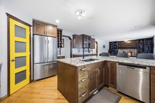 46 Sunset Way Se, Calgary, AB - Indoor Photo Showing Kitchen With Stainless Steel Kitchen