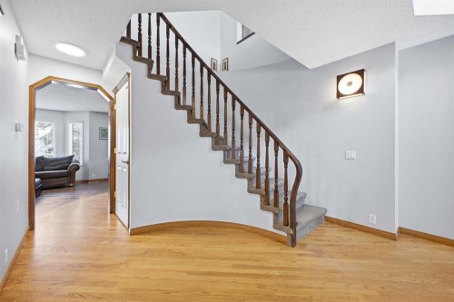 46 Sunset Way Se, Calgary, AB - Indoor Photo Showing Other Room