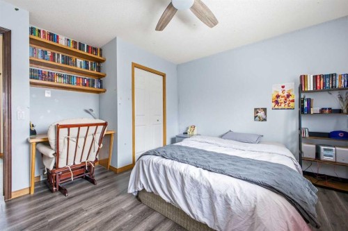46 Sunset Way Se, Calgary, AB - Indoor Photo Showing Bedroom