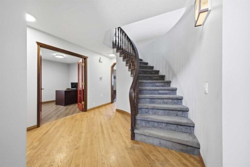 46 Sunset Way Se, Calgary, AB - Indoor Photo Showing Other Room