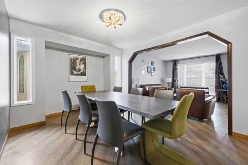 46 Sunset Way Se, Calgary, AB - Indoor Photo Showing Dining Room