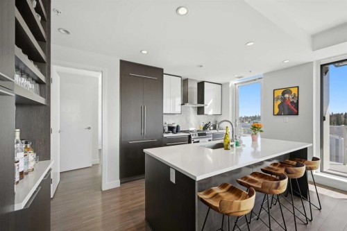 1007-930 16 Avenue Sw, Calgary, AB - Indoor Photo Showing Kitchen With Upgraded Kitchen