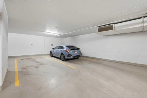 1007-930 16 Avenue Sw, Calgary, AB - Indoor Photo Showing Garage