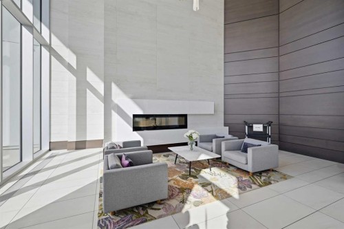 1007-930 16 Avenue Sw, Calgary, AB - Indoor With Fireplace