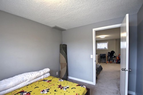 144 Whitmire Road Ne, Calgary, AB - Indoor Photo Showing Bedroom