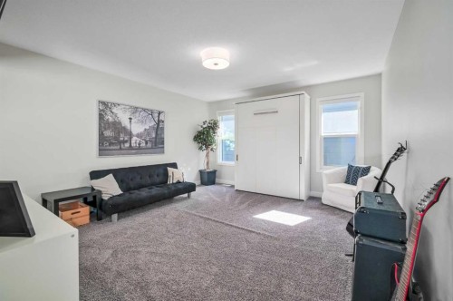 32 Magnolia Heath Se, Calgary, AB - Indoor Photo Showing Other Room