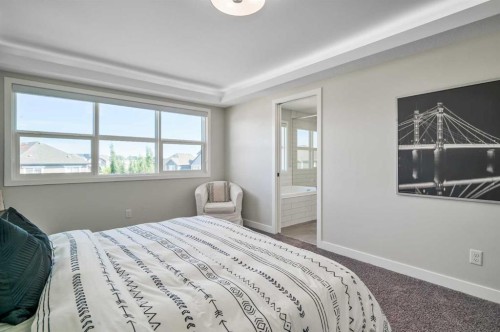 32 Magnolia Heath Se, Calgary, AB - Indoor Photo Showing Bedroom