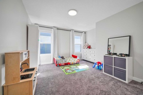 32 Magnolia Heath Se, Calgary, AB - Indoor Photo Showing Other Room