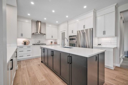 32 Magnolia Heath Se, Calgary, AB - Indoor Photo Showing Kitchen With Upgraded Kitchen