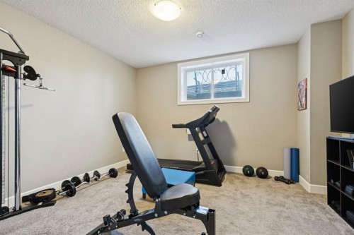 4804 21 Avenue Nw, Calgary, AB - Indoor Photo Showing Gym Room