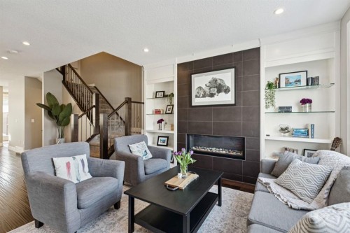 4804 21 Avenue Nw, Calgary, AB - Indoor Photo Showing Living Room With Fireplace