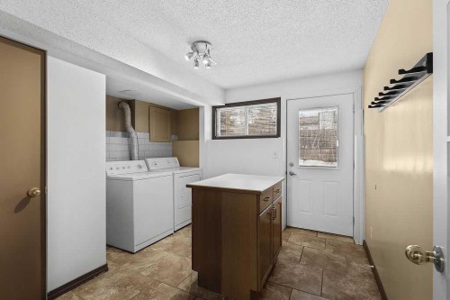 240 Riverbrook Way Se, Calgary, AB - Indoor Photo Showing Laundry Room