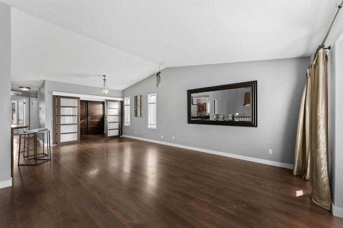 240 Riverbrook Way Se, Calgary, AB - Indoor Photo Showing Living Room