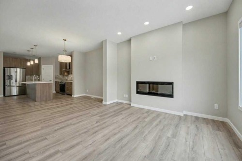 228 Walgrove Way Se, Calgary, AB - Indoor Photo Showing Living Room With Fireplace