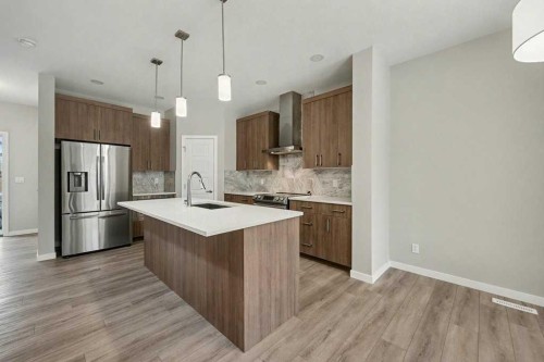 228 Walgrove Way Se, Calgary, AB - Indoor Photo Showing Kitchen With Upgraded Kitchen