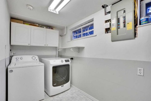 64 Hartford Road Nw, Calgary, AB - Indoor Photo Showing Laundry Room