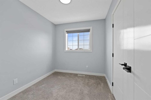 102 Martin Crossing Grove Ne, Calgary, AB - Indoor Photo Showing Other Room