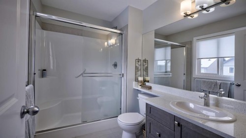 135 Reunion Loop Nw, Airdrie, AB - Indoor Photo Showing Bedroom