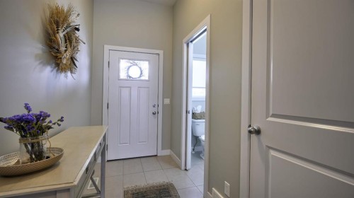 135 Reunion Loop Nw, Airdrie, AB - Outdoor With Facade