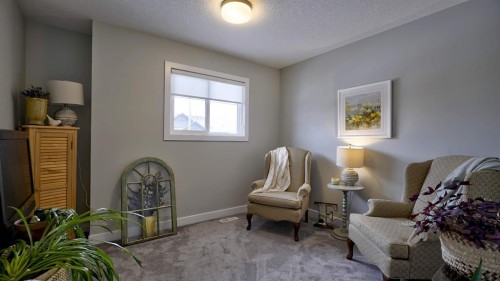 135 Reunion Loop Nw, Airdrie, AB - Indoor Photo Showing Bedroom