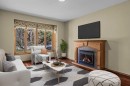 933 15Th Street, Canmore, AB  - Indoor Photo Showing Living Room With Fireplace 