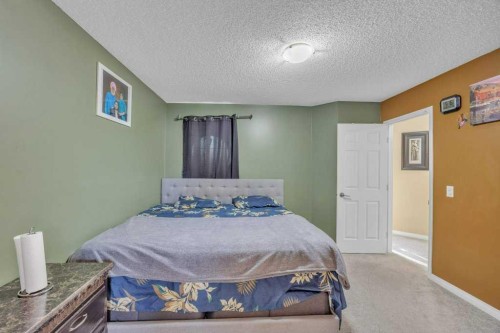 550 Copperfield Boulevard Se, Calgary, AB - Indoor Photo Showing Bedroom