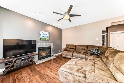 8535 33 Avenue Nw, Calgary, AB - Indoor Photo Showing Living Room With Fireplace